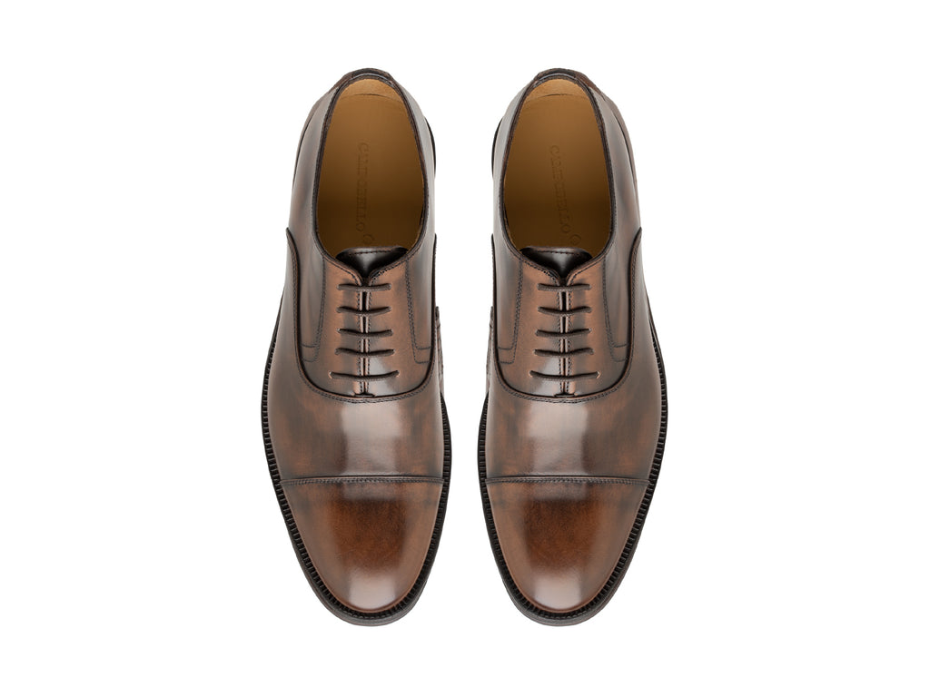 Zapatos Oxford de cuero con acabado manual para hombre